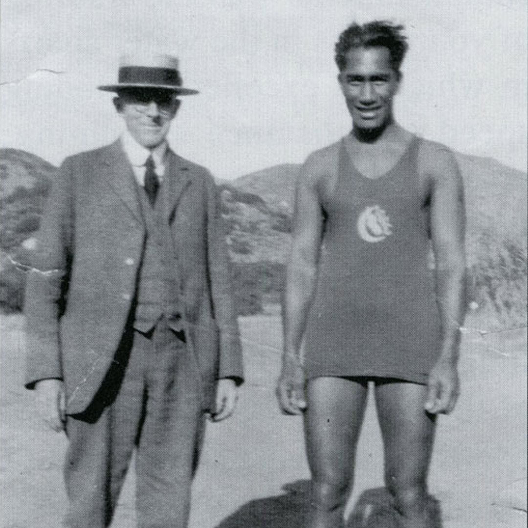 Vintage photo of man in suit and man in swimsuit